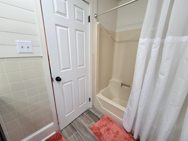 305 57th St Unit 305, Ocean City, NJ 08226 - full bathroom featuring wood tiled floor and shower / tub combo with curtain