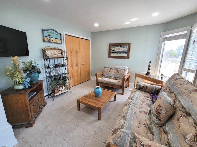 305 57th St Unit 305, Ocean City, NJ 08226 - living room featuring light tile patterned floors and recessed lighting