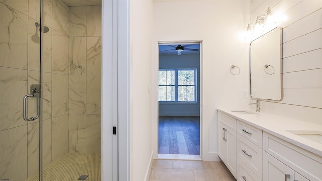 1535 Bear Branch Ct, Vineland, NJ 08362 - bathroom featuring tile patterned flooring, double vanity, a sink, baseboards, and a stall shower
