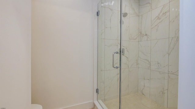 1535 Bear Branch Ct, Vineland, NJ 08362 - bathroom featuring a marble finish shower and baseboards