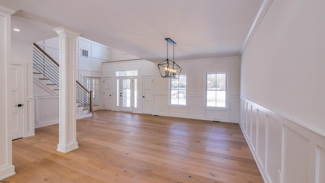 1535 Bear Branch Ct, Vineland, NJ 08362 - entryway with crown molding, stairway, light wood-style flooring, and a decorative wall