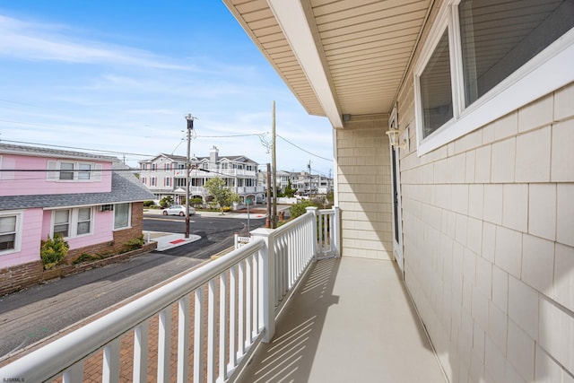 balcony featuring a residential view