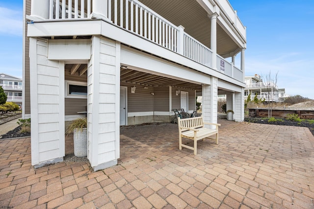 view of patio with a balcony
