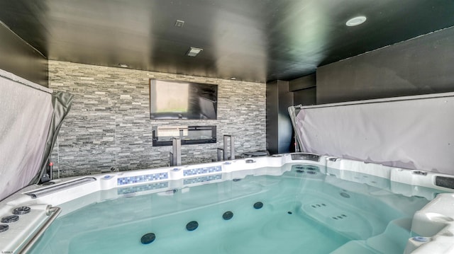 interior space featuring a jetted tub