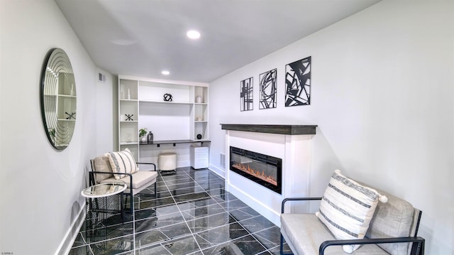 21 Hart Ln, Ventnor, NJ 08406 - living area with a glass covered fireplace, dark marble finish flooring, recessed lighting, and baseboards
