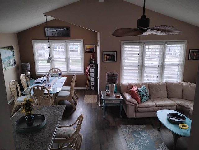 living room with vaulted ceiling, a ceiling fan, dark wood-type flooring, and baseboards