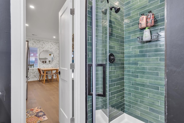 129 Seaside, Atlantic City, NJ 08401 - full bathroom with a shower stall, wallpapered walls, and wood finished floors