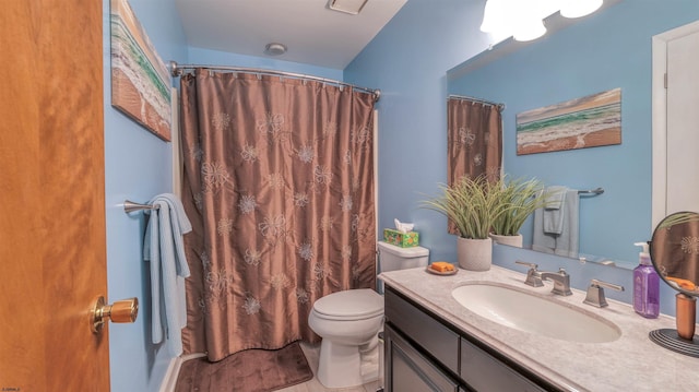 full bath featuring curtained shower, toilet, and vanity