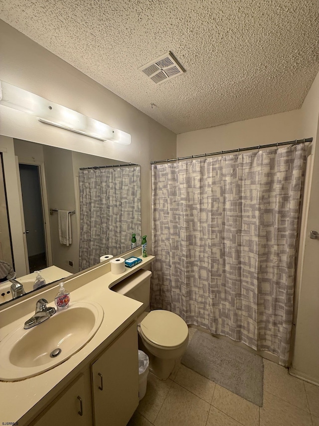 25 Liberty Ct Unit 25, Galloway Township, NJ 08205 - full bathroom featuring a textured ceiling, visible vents, tile patterned flooring, vanity, and toilet