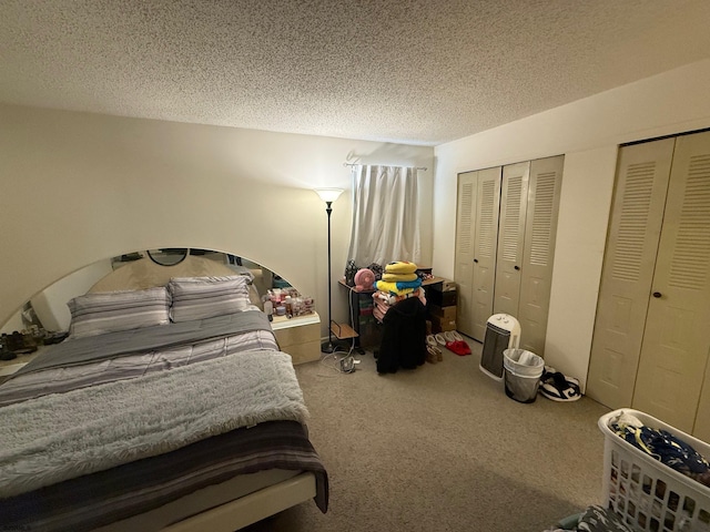 25 Liberty Ct Unit 25, Galloway Township, NJ 08205 - bedroom with a textured ceiling, multiple closets, and carpet