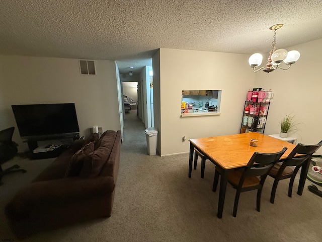 25 Liberty Ct Unit 25, Galloway Township, NJ 08205 - dining room featuring a notable chandelier, carpet flooring, a textured ceiling, and visible vents