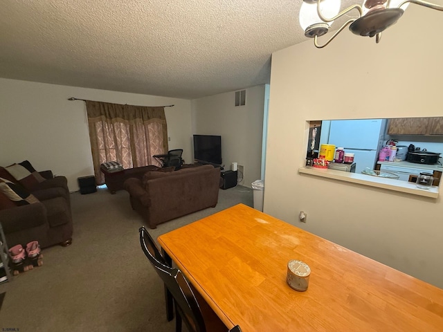 25 Liberty Ct Unit 25, Galloway Township, NJ 08205 - dining room with visible vents, a textured ceiling, and carpet floors