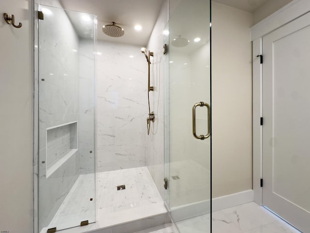 5513 W Ave Fl 1St, Ocean City, NJ 08226 - bathroom with a marble finish shower and marble finish floor