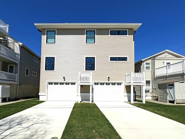 5513 W Ave Fl 1St, Ocean City, NJ 08226 - view of front facade with driveway and a garage