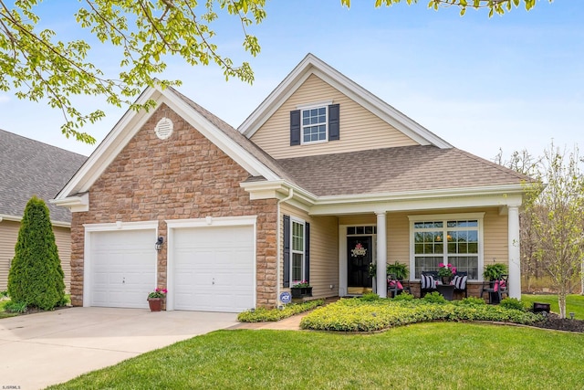 220 Ivy Rd, Egg Harbor Township, NJ 08234 - view of front of home with a front yard, a garage, concrete driveway, a shingled roof, and stone siding
