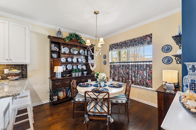 220 Ivy Rd, Egg Harbor Township, NJ 08234 - dining space featuring crown molding, baseboards, an inviting chandelier, and dark wood-style flooring
