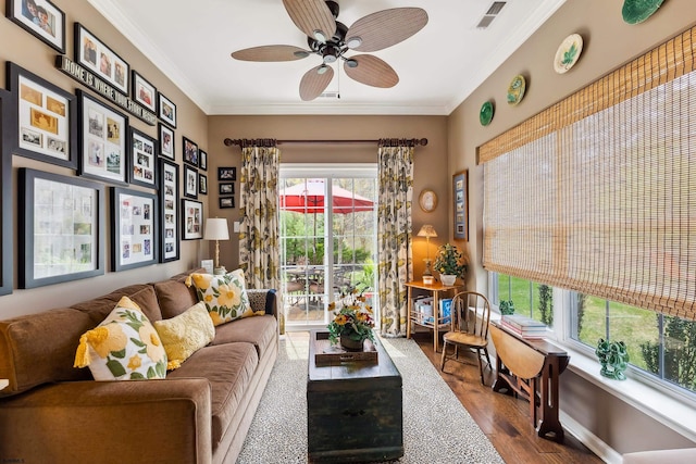 220 Ivy Rd, Egg Harbor Township, NJ 08234 - living area with visible vents, crown molding, wood finished floors, and ceiling fan