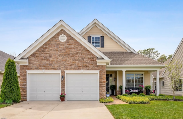 220 Ivy Rd, Egg Harbor Township, NJ 08234 - view of front of home with roof with shingles, an attached garage, stone siding, covered porch, and driveway