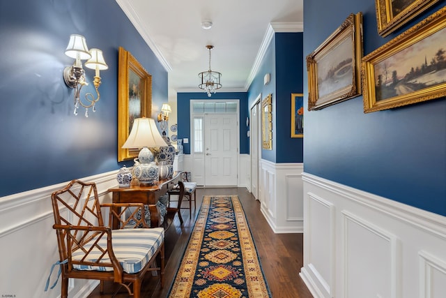 220 Ivy Rd, Egg Harbor Township, NJ 08234 - doorway to outside featuring dark wood-style flooring, a wainscoted wall, a chandelier, ornamental molding, and a decorative wall