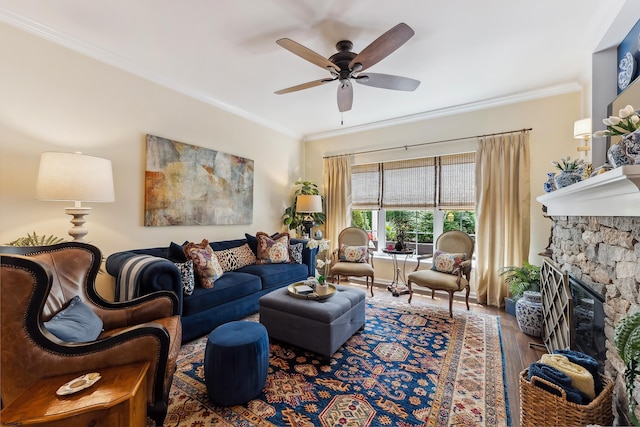 220 Ivy Rd, Egg Harbor Township, NJ 08234 - living area featuring ornamental molding, a stone fireplace, a ceiling fan, and wood finished floors