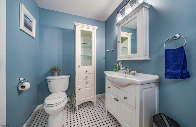 226 Asbury Ave, Ocean City, NJ 08226 - bathroom featuring toilet, baseboards, tile patterned floors, and vanity