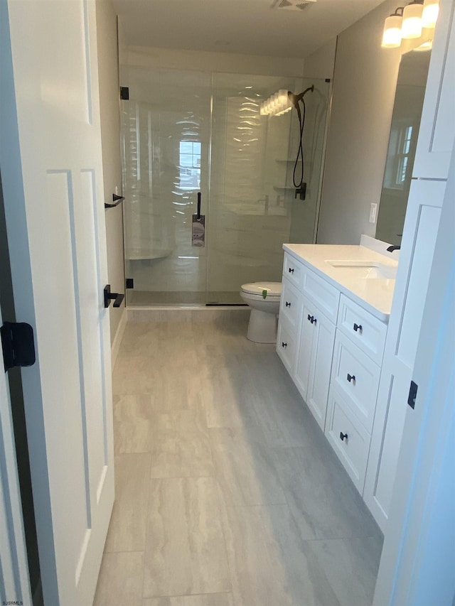 1243 Bay Ave, Ocean City, NJ 08226 - full bath featuring vanity, a walk in shower, visible vents, and toilet