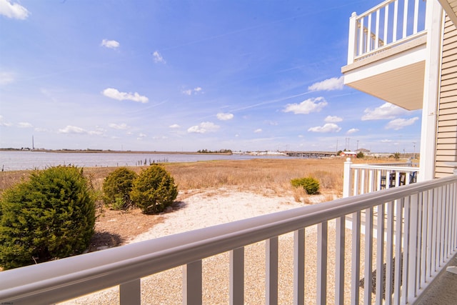 balcony featuring a water view