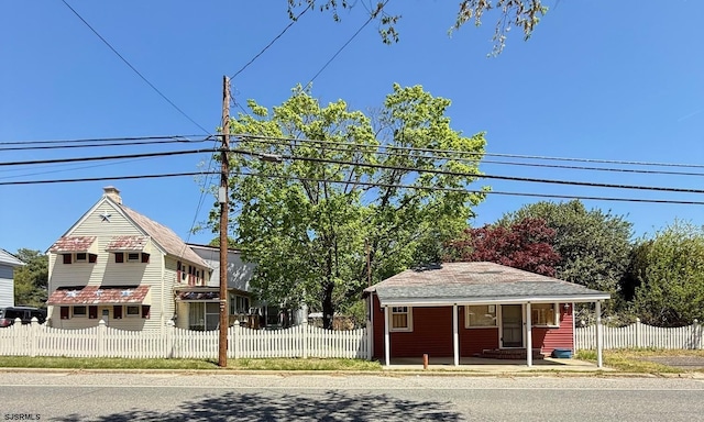 exterior space with a fenced front yard