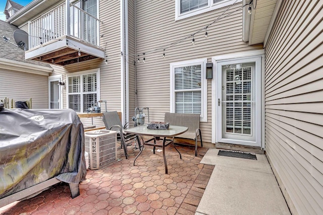 38 Lighthouse Ct Unit 38, Atlantic City, NJ 08401 - view of patio / terrace featuring a balcony, central AC unit, outdoor dining space, and grilling area