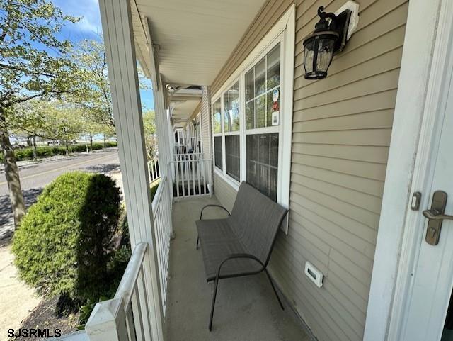 balcony featuring a porch