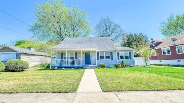 120 Lenape Ln, Absecon, NJ 08201 - bungalow featuring fence, covered porch, and a front yard