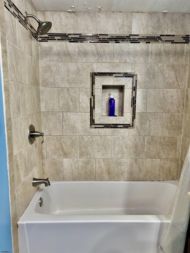full bathroom with shower / bathtub combination with curtain