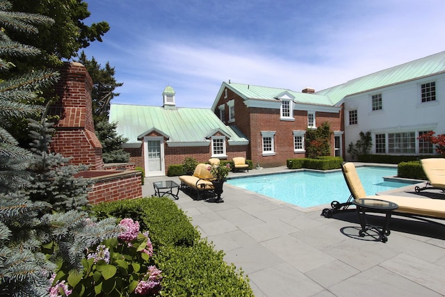 pool featuring a patio