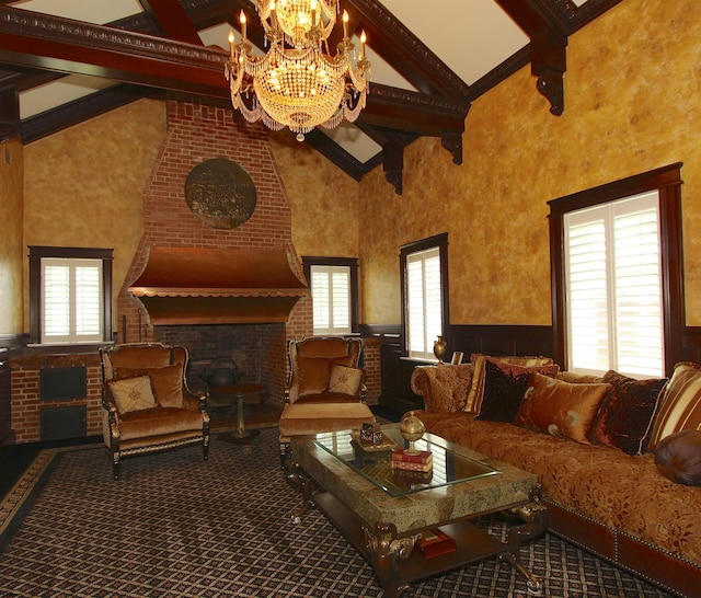 interior space featuring an inviting chandelier, wainscoting, beam ceiling, a fireplace, and high vaulted ceiling