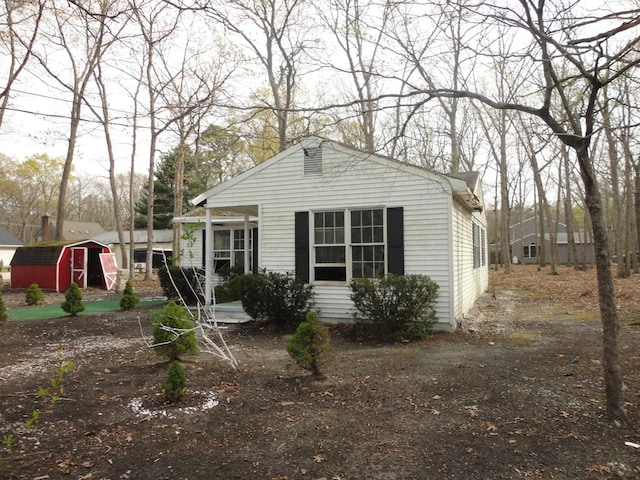 129 Bayberry Ave, Egg Harbor Township, NJ 08234 - view of front of house with a storage shed and an outdoor structure