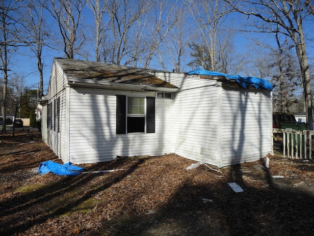 129 Bayberry Ave, Egg Harbor Township, NJ 08234 - view of side of property featuring fence and a shingled roof