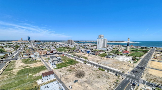 bird's eye view with a water view and a city view