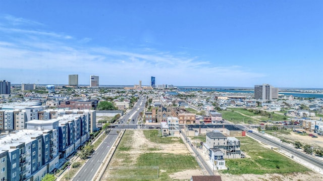 birds eye view of property with a city view