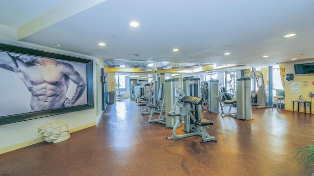gym featuring recessed lighting and baseboards