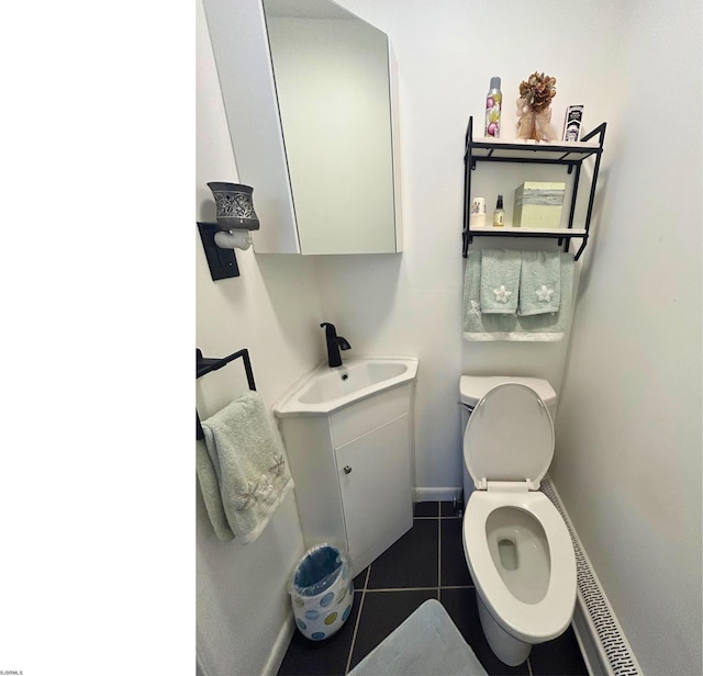 306 W Revere Ave, Northfield, NJ 08225 - half bathroom featuring toilet, baseboards, tile patterned flooring, and vanity