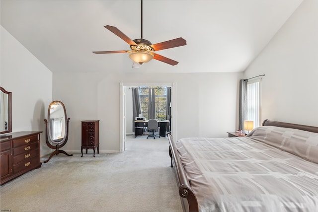 bedroom with baseboards, ceiling fan, vaulted ceiling, and light carpet