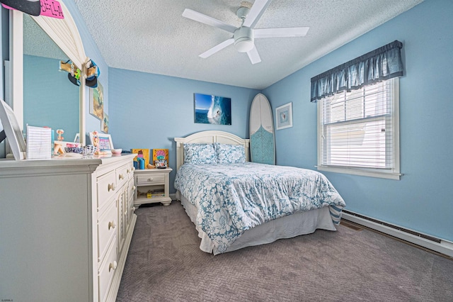 bedroom featuring carpet floors, ceiling fan, baseboard heating, and a textured ceiling