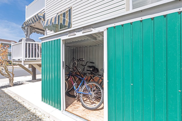 property entrance featuring board and batten siding