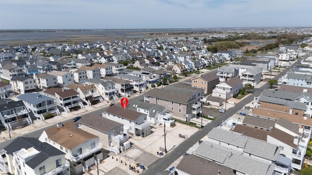 birds eye view of property with a residential view
