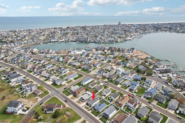 aerial view with a residential view and a water view