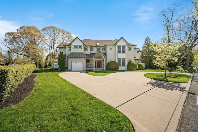 104 Van Sant Ave, Linwood, NJ 08221 - view of front of property with a standing seam roof, curved driveway, an attached garage, and a front yard
