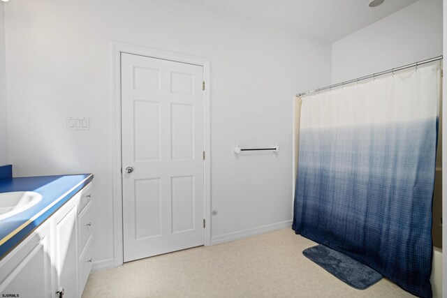 104 Van Sant Ave, Linwood, NJ 08221 - bathroom with vanity, baseboards, and a shower with shower curtain