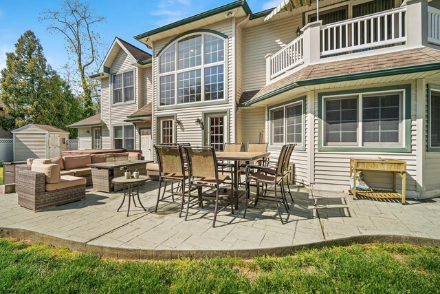 104 Van Sant Ave, Linwood, NJ 08221 - view of patio with outdoor dining space, an outdoor hangout area, a shed, a balcony, and an outdoor structure