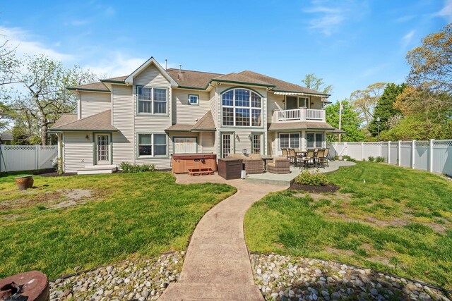 104 Van Sant Ave, Linwood, NJ 08221 - back of property featuring an outdoor living space, a hot tub, a fenced backyard, a balcony, and a yard