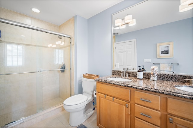 111 N Madison Ave Unit 2, Margate, NJ 08402 - full bath with a sink, double vanity, toilet, tile patterned floors, and a stall shower